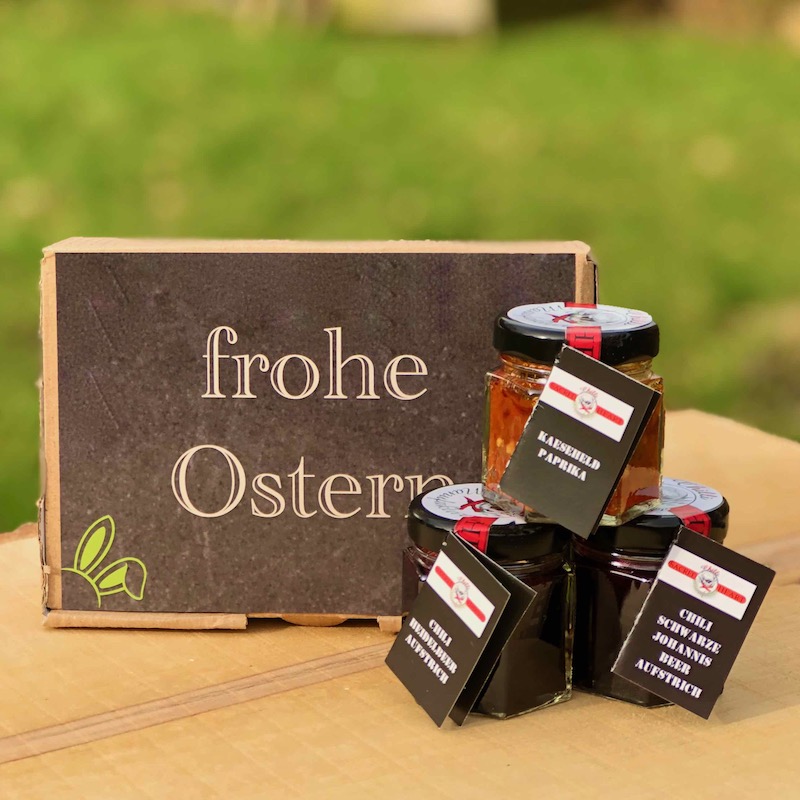 Kleines Ostergeschenk bestehend aus einer Geschenkbox mit drei kleinen Gläsern von der Chilli Manufaktur mit Aufdruck frohe Ostern kaufen