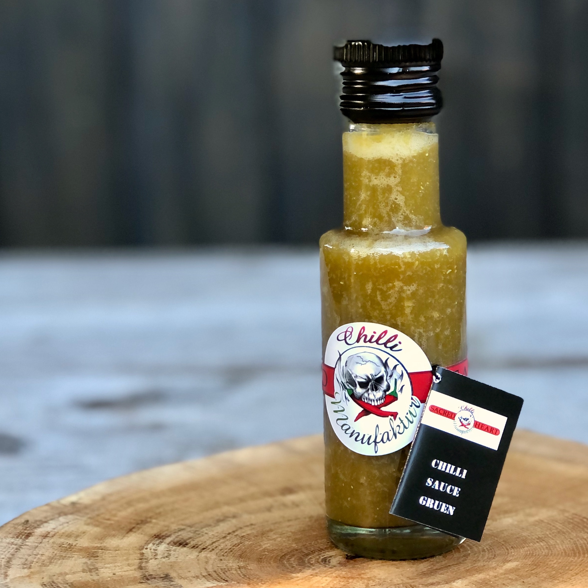 Flasche mit grüner Jalapeno Chili Sauce zum Kaufen