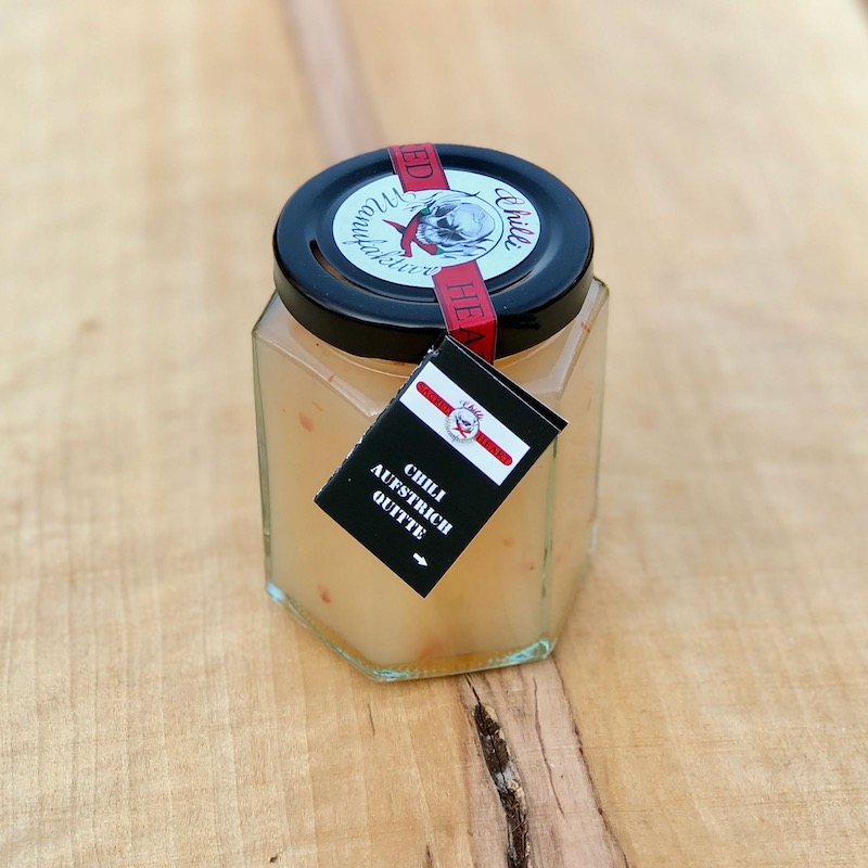 Quittenaufstrich mit leichter Chili-Schäre kaufen Quitten Aufstrich mit leichter Chili-Schärfe im Glas von der Chilli Manufaktur kaufen