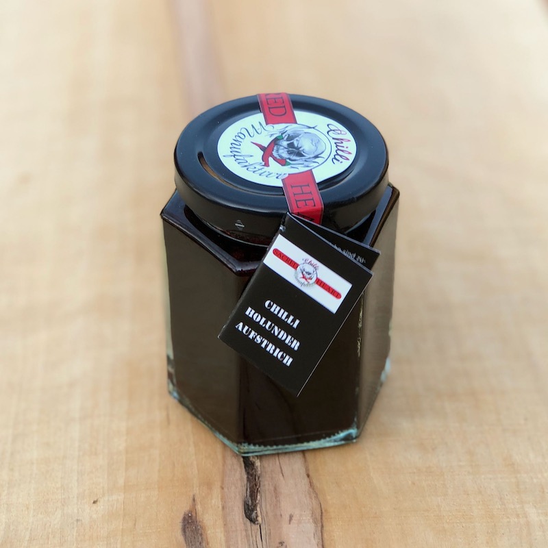 Fruchtaufstrich Holunder mit Chili Fruchtaufstrich Holunder mit Chili im Glas von der Chilli Manufaktur kaufen